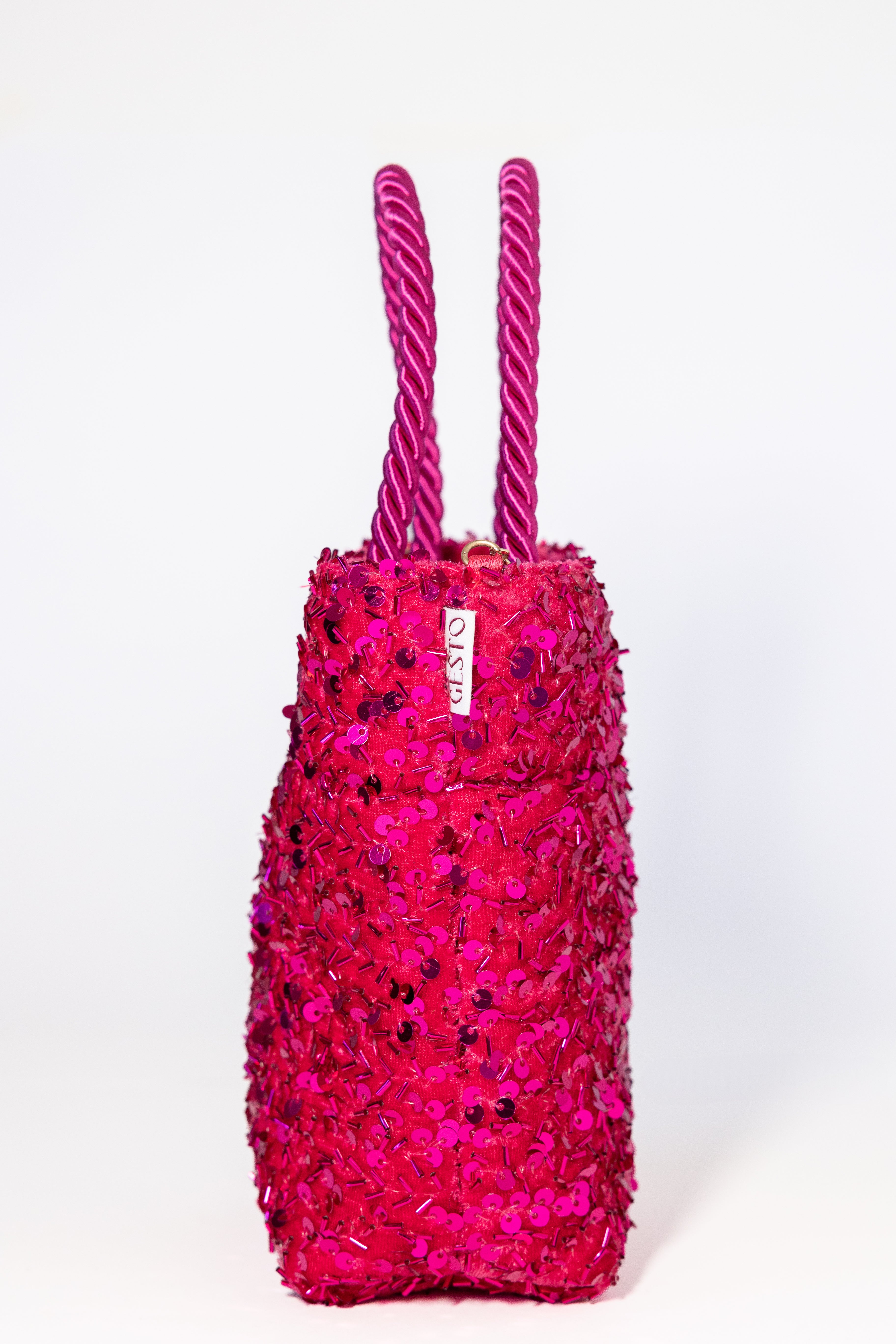 MAIA. Bolso de lentejuelas rosa