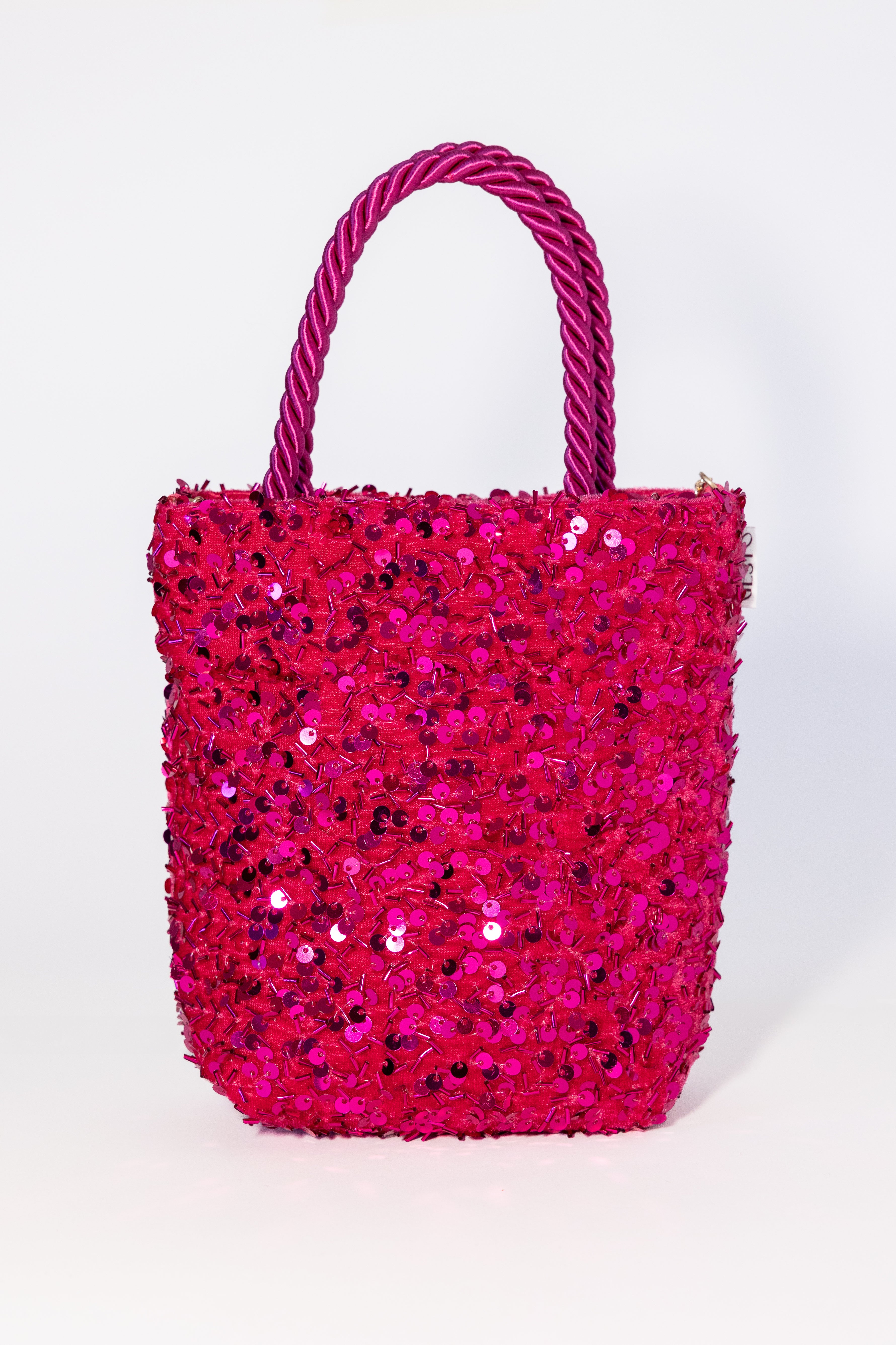 MAIA. Bolso de lentejuelas rosa