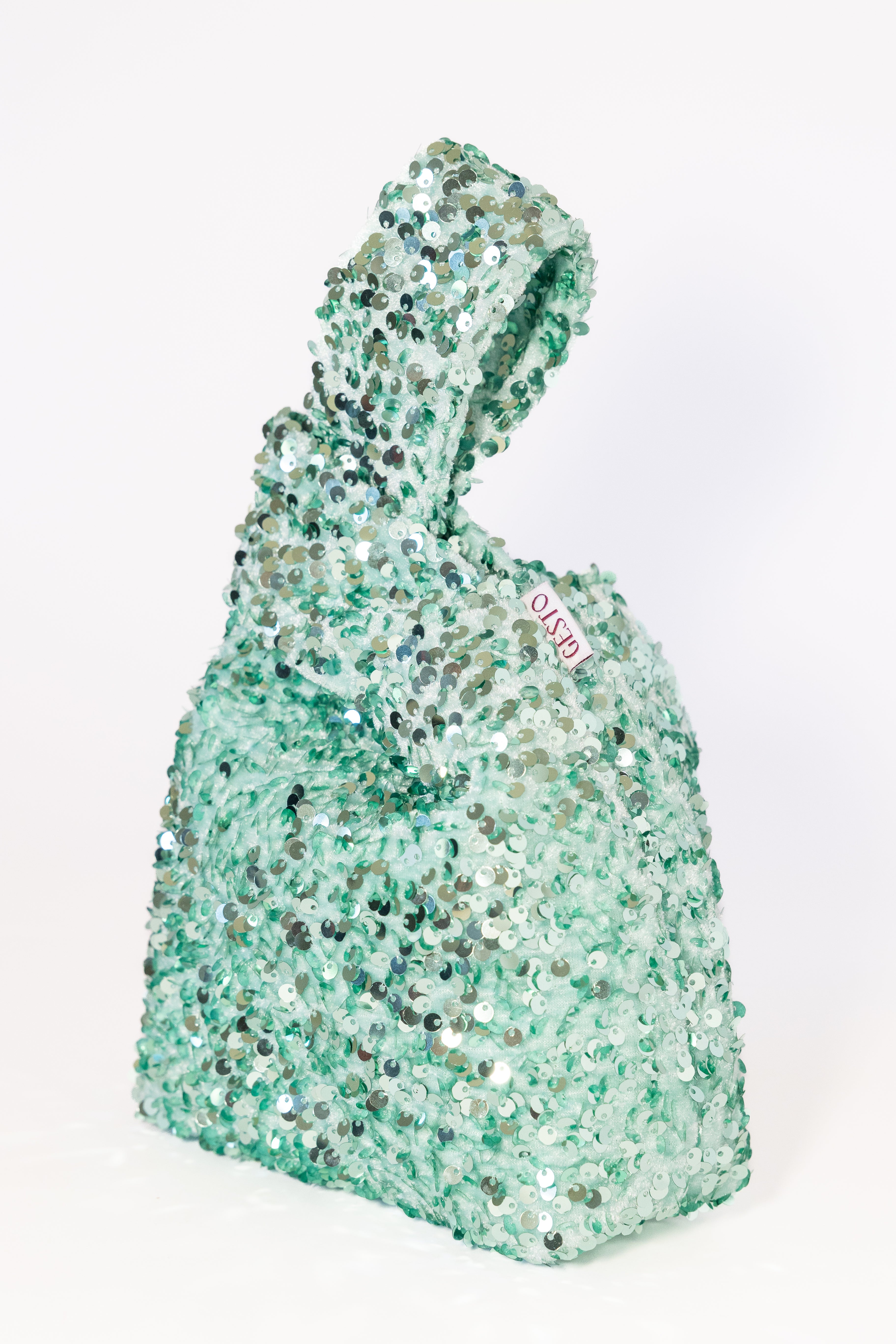 NOVA. Bolso de lentejuelas verde agua