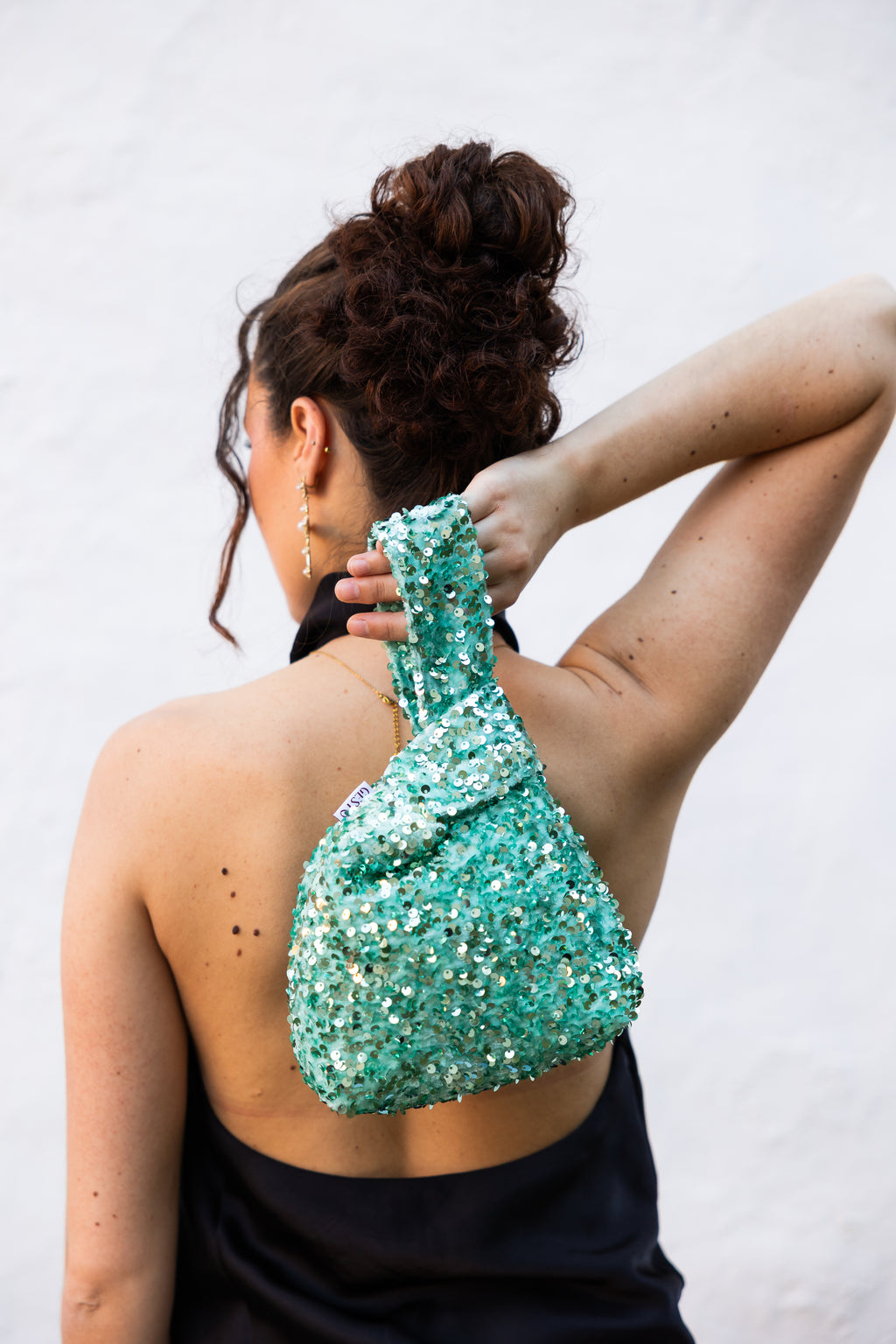 NOVA. Bolso de lentejuelas verde agua