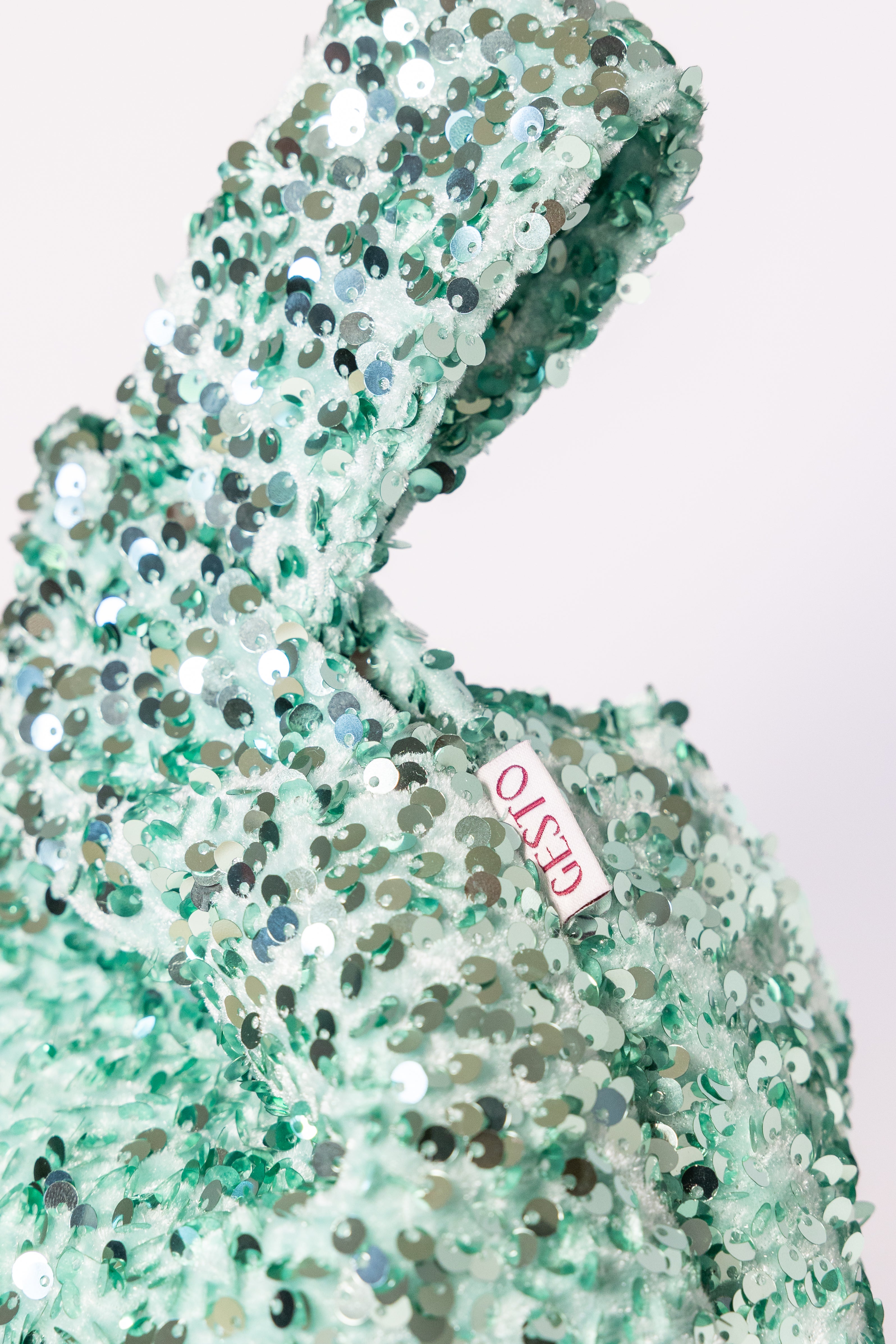 NOVA. Bolso de lentejuelas verde agua
