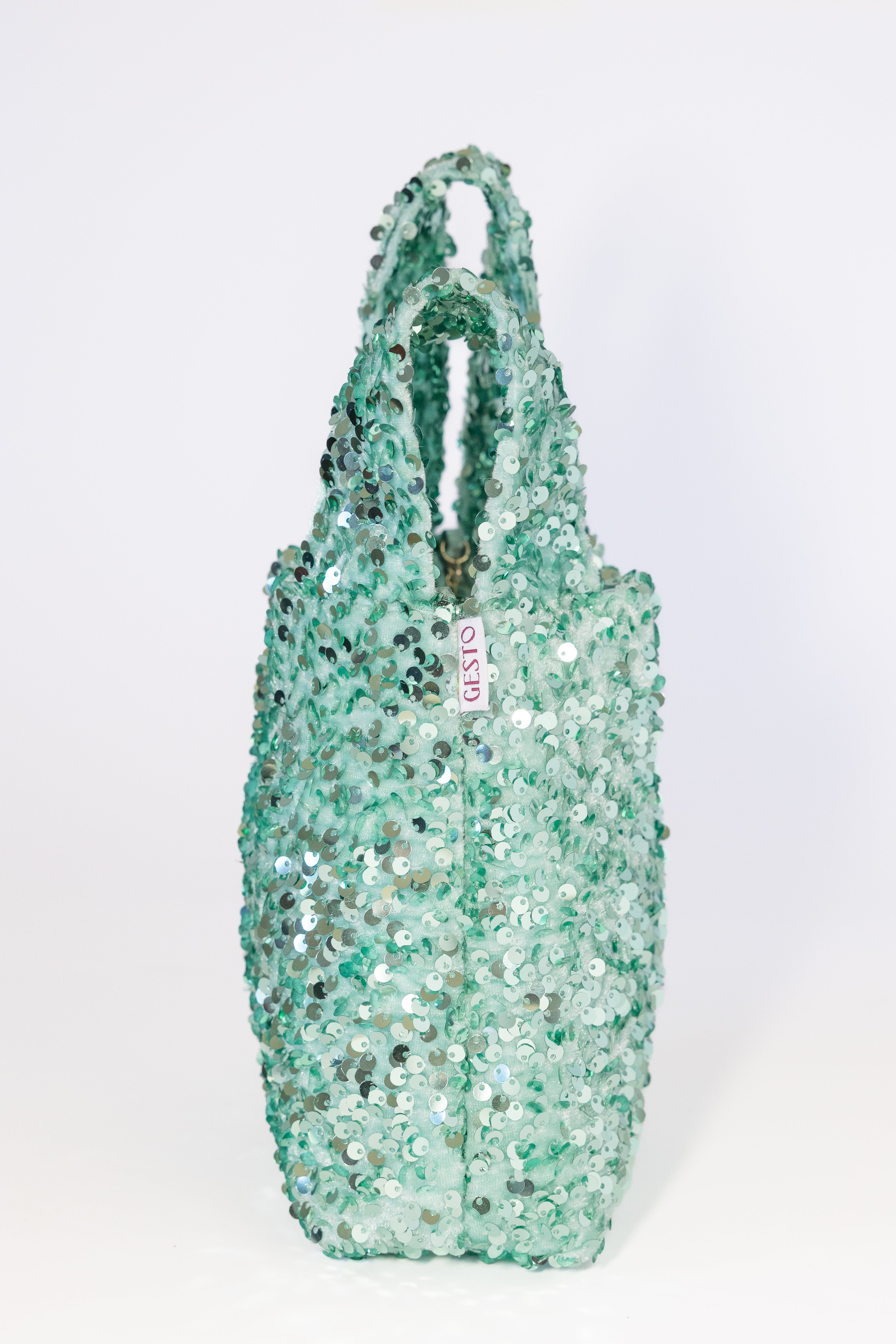 NOVA. Bolso de lentejuelas verde agua