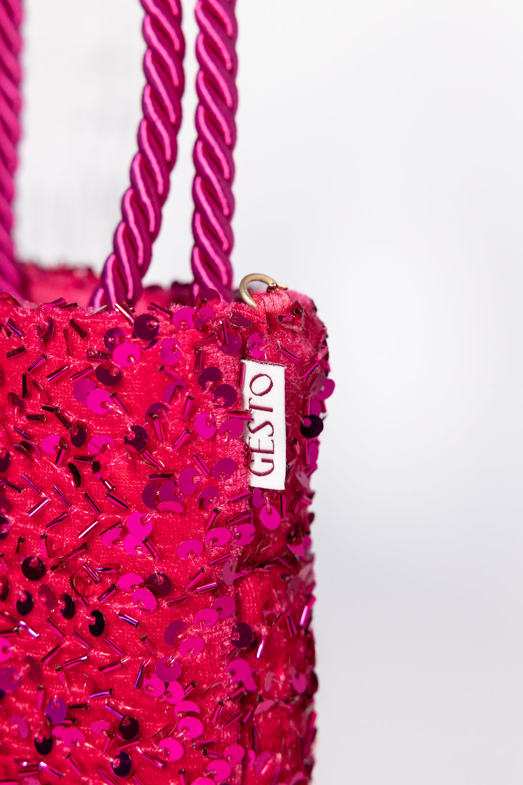 MAIA. Bolso de lentejuelas rosa