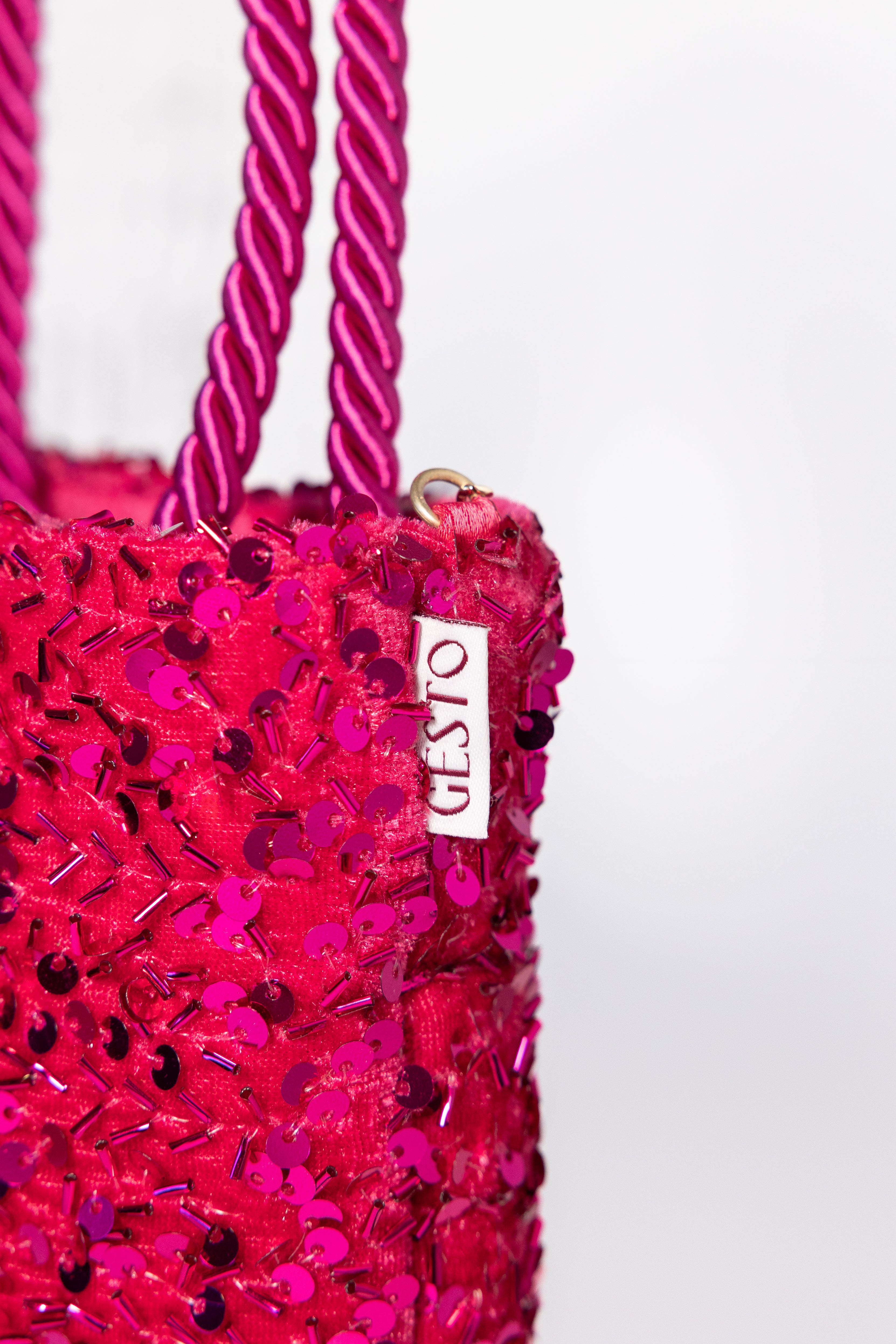 MAIA. Bolso de lentejuelas rosa